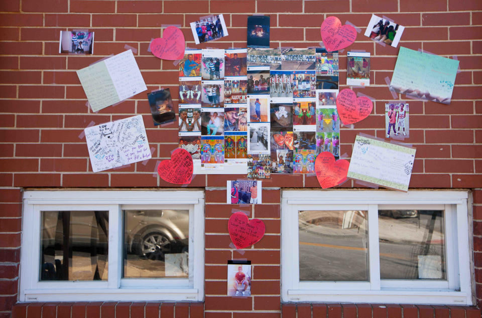 Photos and messages for A.I. duPont freshman Jordon Ellerbe, 16, hang in front of his home on Rodney Street in Wilmington in 2015. He was killed when gunmen sprayed a front porch in Hilltop with bullets, injuring two others in the process.