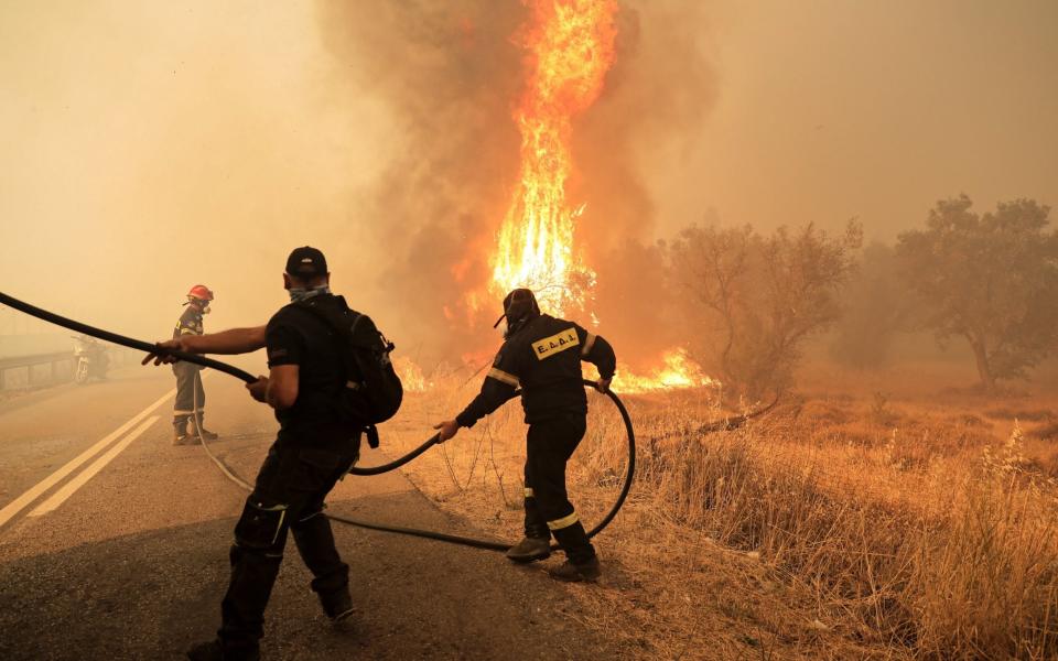 Firefighters fighting the blaze in Varibobi, Athens, Greece - Athena Picture Agency Ltd /Athena Picture Agency Ltd 