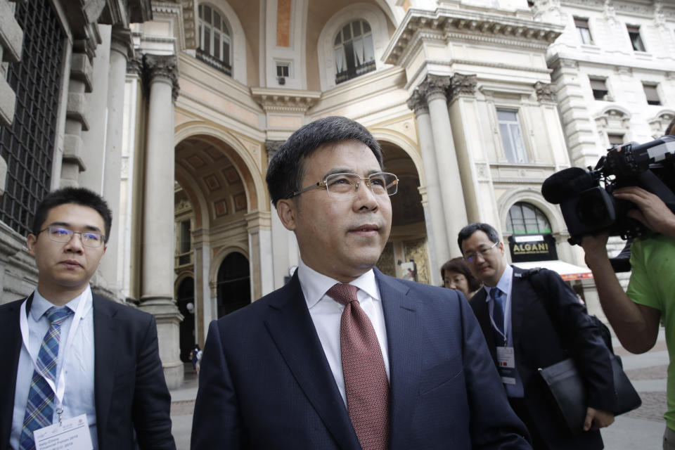 Bank of China chairman, Liu Liange, arrives on the occasion of the Italy-China Financial forum, at Palazzo Marino town hall, in Milan, Italy, Wednesday, July 10, 2019. (AP Photo/Luca Bruno)