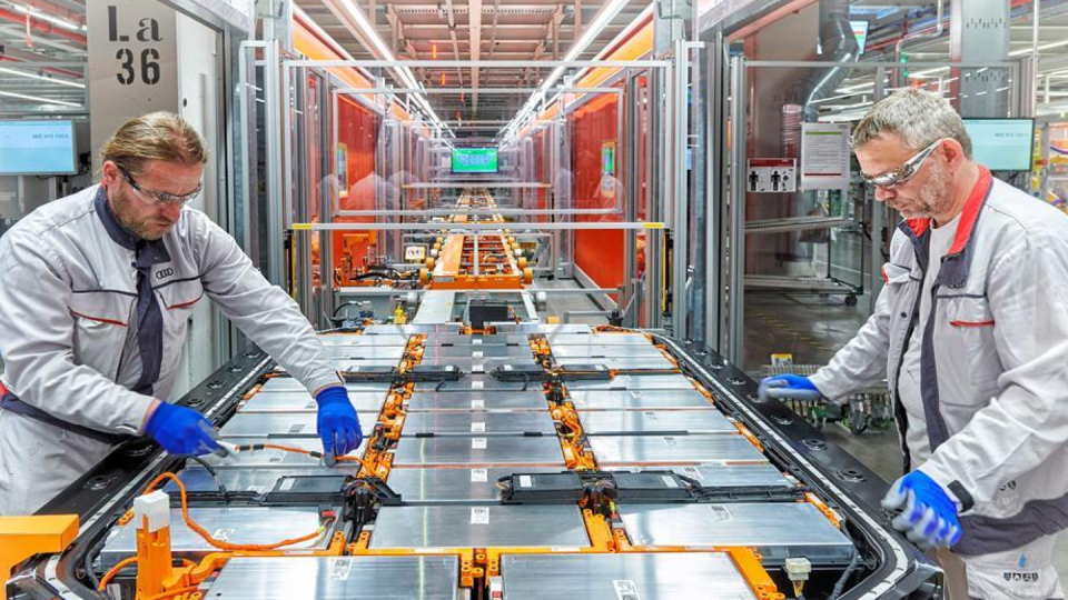 men working in an ev battery factory