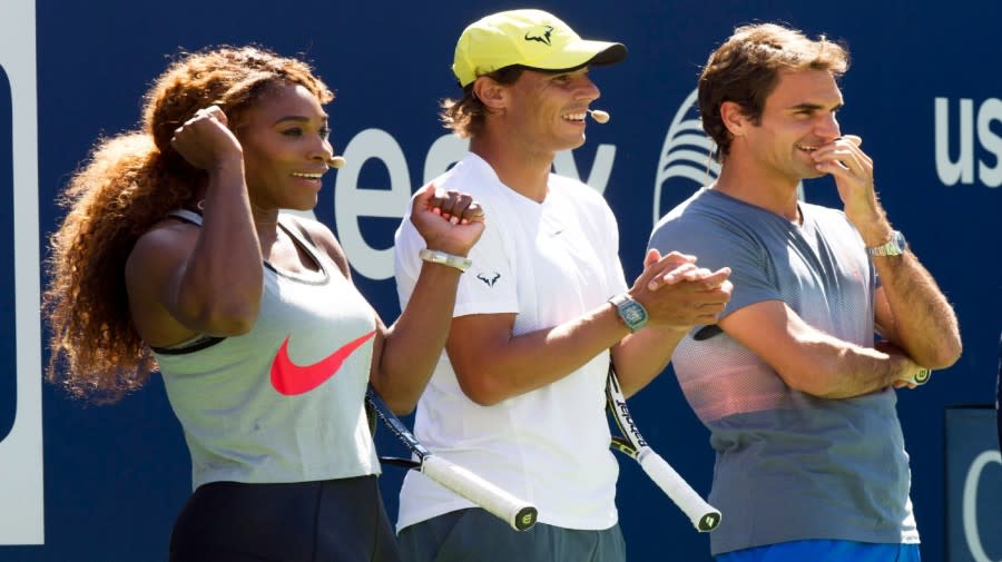 <em>In this Aug. 24, 2013, file photo, tennis players, from left, Serena Williams, Rafael Nadal and Roger Federer cheer on the competition at the 18th Annual Arthur Ashe Kids’ Day, the kick off to the 2013 US Open tennis tournament, on Saturday, in New York. (Photo by Charles Sykes/Invision/AP, File)</em>