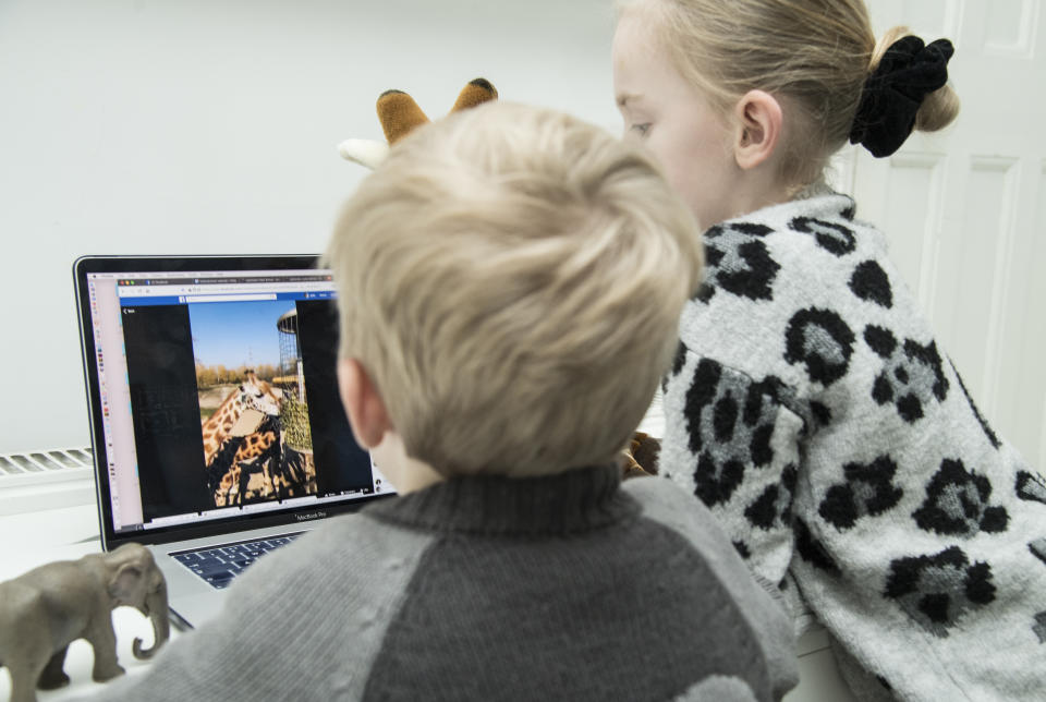 Mia and Jack watch as Chester Zoo host a live tour of its facilities to entertain those in isolation due to the Coronavirus pandemic. (Photo by Ian West/PA Images via Getty Images)