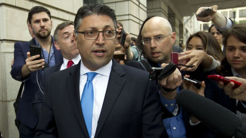 Assistant Attorney General for Antitrust Makan Delrahim leaves the federal courthouse Tuesday, June 12, 2018, in Washington. A federal judge approved the $85 billion mega-merger of AT&T and Time Warner on Tuesday, a move that could usher in a wave of media consolidation while shaping how much consumers pay for streaming TV and movies. (AP Photo/Jose Luis Magana)