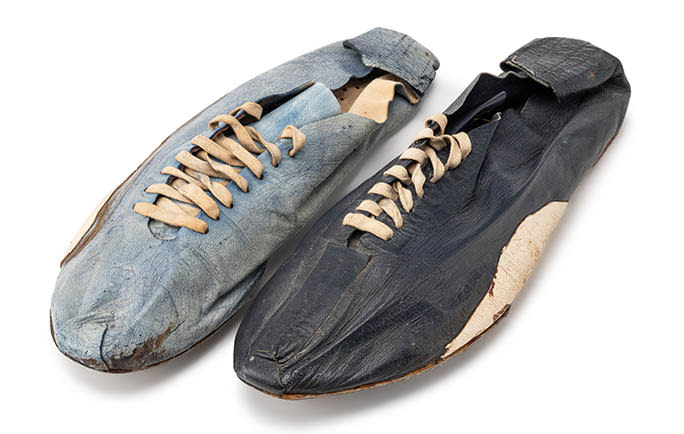 Nike co-founder Bill Bowerman 1960s pre-Nike handmade black and blue track spikes.