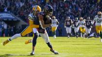 Chicago Bears' Equanimeous St. Brown catches a long pass in front of Green Bay Packers' Jaire Alexander during the first half of an NFL football game Sunday, Dec. 4, 2022, in Chicago. (AP Photo/Nam Y. Huh)