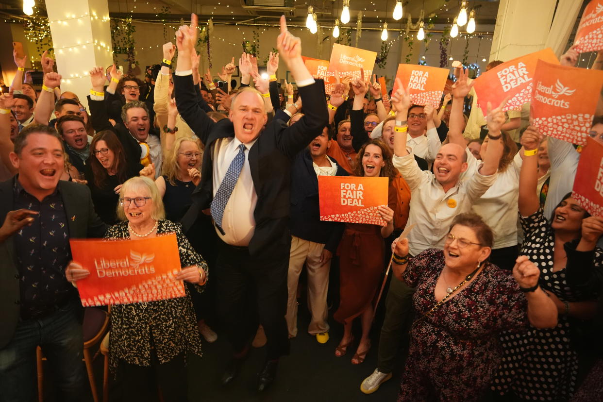 Liberal Democrat leader Sir Ed Davey celebrates with party supporters in central London. (PA)