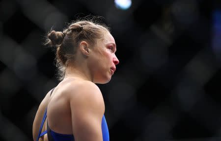 December 30, 2016; Las Vegas, NV, USA; Ronda Rousey reacts following her TKO defeat against Amanda Nunes during UFC 207 at T-Mobile Arena. Mark J. Rebilas-USA TODAY Sports