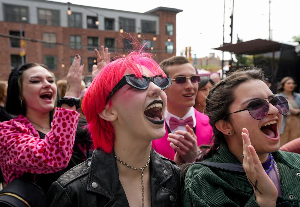 Nina Rush, left to right, Ziggy Baker, Parker Sutliff and Kat McDonald-Wilson cheer for the New York City punk band sorry mom at the Women That Rock day party at Cheer Up Charlie’s during SXSW 2023. There will be numerous day parties and events that don't require credentials at SXSW 2024.