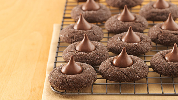 Chocolate cookies, each topped with a Hershey Kiss