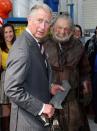 WELLINGTON, NEW ZEALAND - NOVEMBER 14: Prince Charles, Prince of Wales holds a sword after meeting Mark Hadlow who plays Dori in the new 'Hobbit' film at Weta Workshop on November 14, 2012 in Wellington, New Zealand. The Royal couple are in New Zealand on the last leg of a Diamond Jubilee that takes in Papua New Guinea, Australia and New Zealand. (Photo by Chris Jackson/Getty Images)