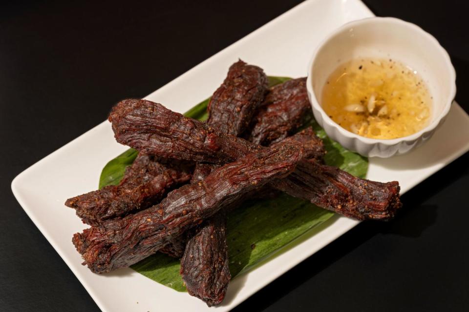 Strips of beef Jerky with a dipping sauce