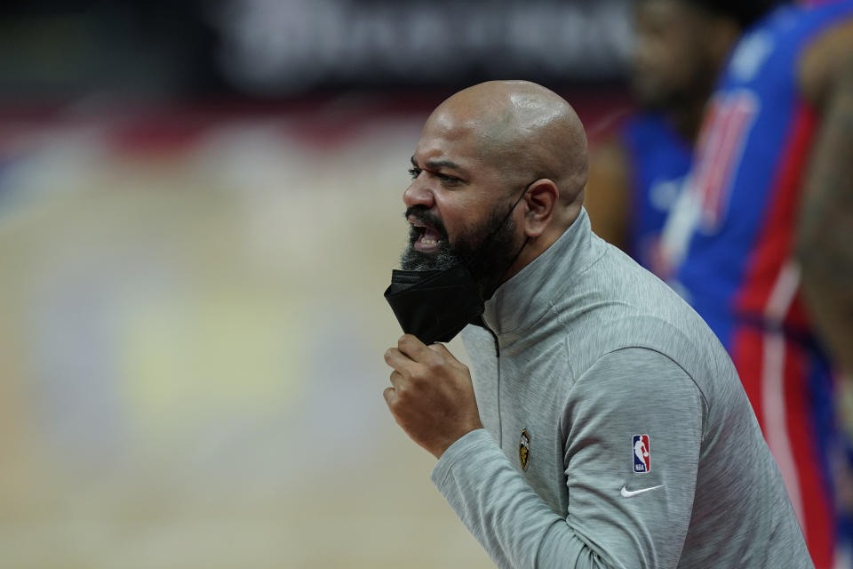 Cleveland Cavaliers head coach J.B. Bickerstaff directs from the sideline during the first half of an NBA basketball game against the Detroit Pistons, Monday, April 19, 2021, in Detroit. (AP Photo/Carlos Osorio)