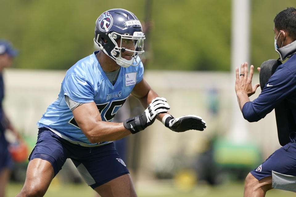 Tennessee Titans linebacker Rashad Weaver runs a drill during NFL football rookie minicamp Saturday, May 15, 2021, in Nashville, Tenn. (AP Photo/Mark Humphrey, Pool)