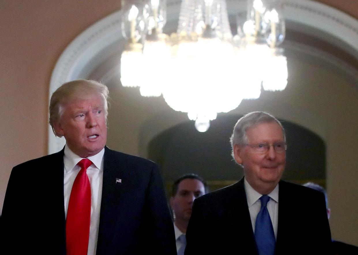 President-elect Donald Trump walks from a meeting with Senate Majority Leader Mitch McConnell in November: Getty Images