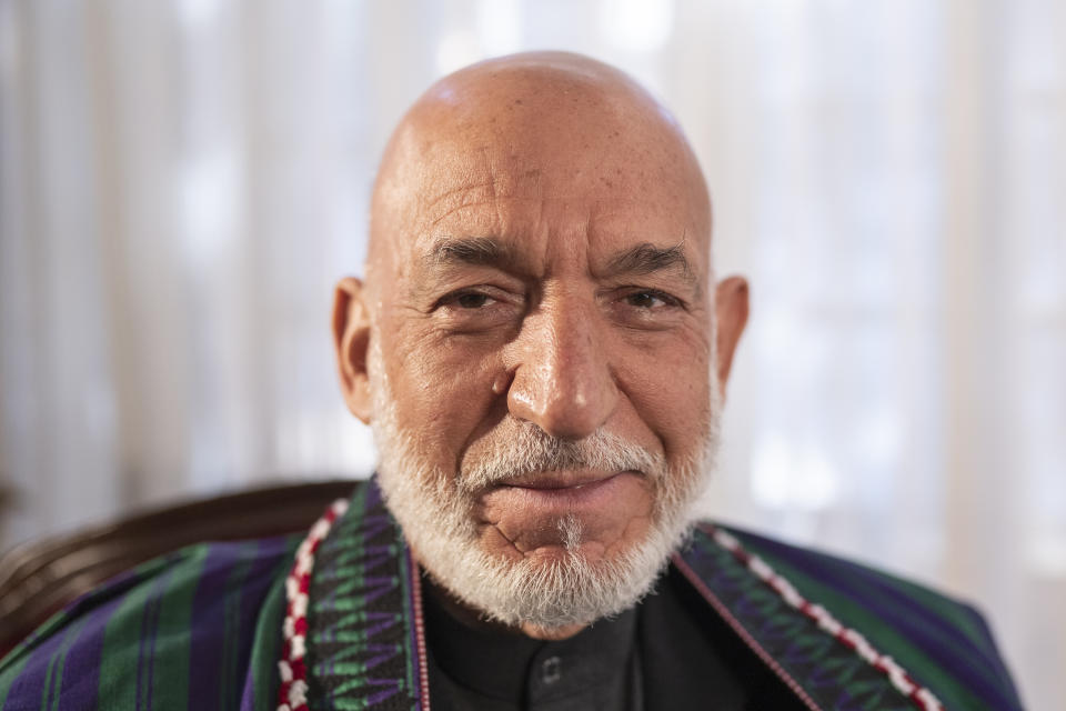 Former President of Afghanistan Hamid Karzai poses for a photo during an interview with the Associated Press in Kabul , Afghanistan, on Friday, Dec. 10, 2021. (AP Photo/Petros Giannakouris)