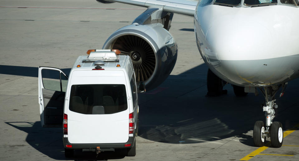 Passengers reportedly had to wait two hours for the body of a dead man to be removed from a flight forced to land at Cairns Airport. Source: Getty Images (File pic)