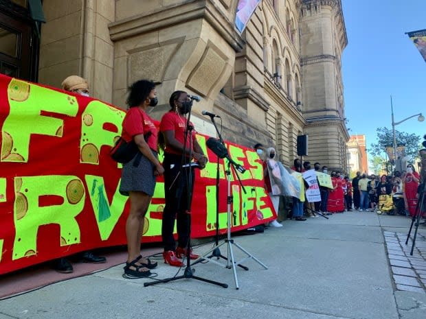 A rally held Saturday in Ottawa featured the families of 10 people who either died or were injured during encounters with police. (Natalia Goodwin/CBC  - image credit)