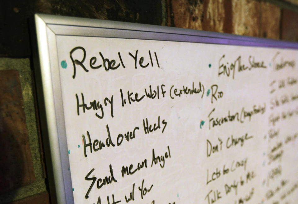 The Billy Idol song "Rebel Yell" is shown at the top of a song list during a rehearsal of Michael Henrichsen's 80's music tribute band, "Nite Wave," Oct. 3, 2012, in Lynnwood, Wash. Henrichsen created a website and enlisted friends and celebrities around the world in a two-year effort to convince rock star Idol to come play a concert on Oct. 26, 2012 at a Seattle music venue to raise money for charity and celebrate Henrichsen's birthday. (AP Photo/Ted S. Warren)