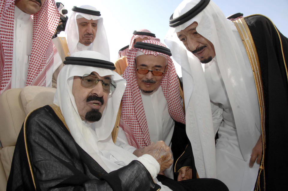 FILE - In this Monday, Nov. 22, 2010 file photo released by the Saudi Press Agency, Saudi Arabia's King Abdullah, left, speaks with Prince Salman, the Saudi King's brother and Riyadh Governor, right, before the King's departure to United States, in Riyadh, Saudi Arabia. While Saudi Arabia’s royals work out the succession of the throne behind closed doors, a few voices are raising the most sensitive matter of all in the kingdom, questioning the ruling Al Saud family’s claim to power and its unchecked rights to the country’s oil wealth. The next monarch will inherit a country where half of the population of 20 million people is under the age of 25, in need of jobs, access to housing, education and transportation. (AP Photo, File) EDITORIAL USE ONLY, NO SALES