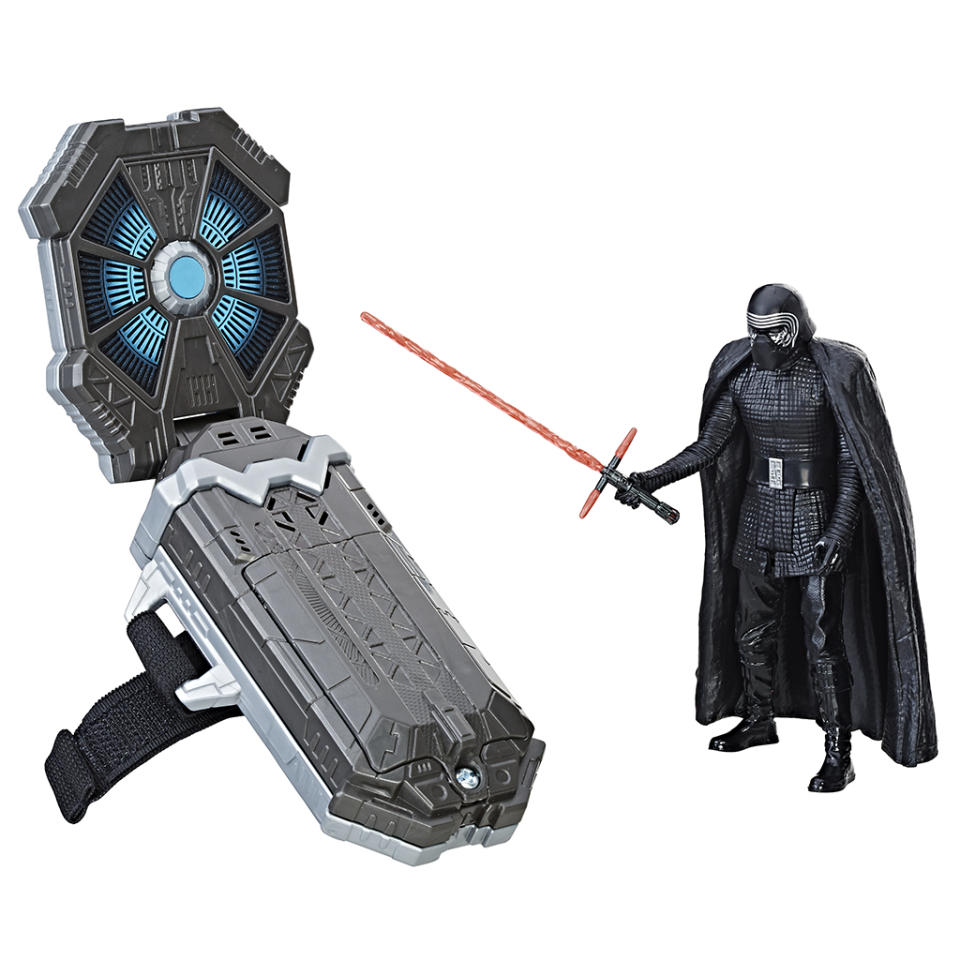 <p>Hasbro’s wearable tech activates sounds, phrases, and lights in more than 30 compatible toys. This set comes with an exclusive Kylo figure. $24.99 (Photo: Hasbro) </p>