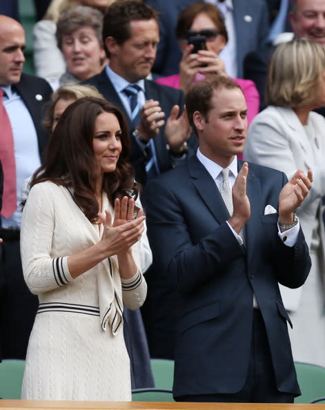 Catherine, Duchess of Cambridge and Prince William, Duke of Cambridge applaud from their seats in the Royal Box on Centre Court during day nine of the Wimbledon Lawn Tennis Championships at the All England Lawn Tennis and Croquet Club on July 4, 2012 in London, England. (Photo by Clive Rose/Getty Images)