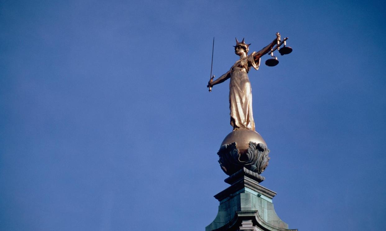 <span>Justice statue on the Old Bailey law courts in central London.</span><span>Photograph: Alamy</span>