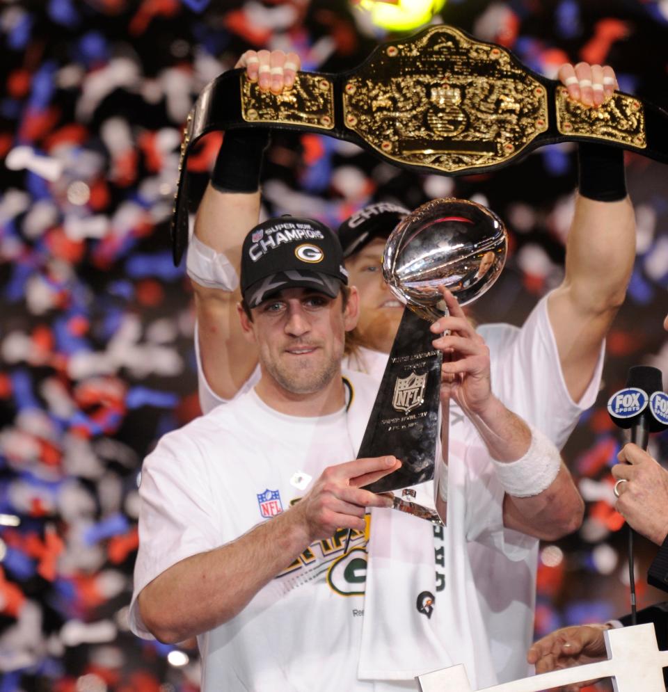 Aaron Rodgers holds the Lombardi Trophy after the Green Bay Packers won Super Bowl XLV.