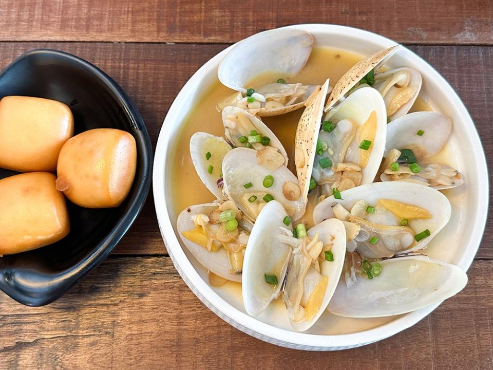 Tulya Clams from the fish tank is addictive with the garlic and dashi broth served with it