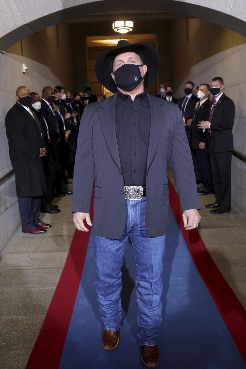 Garth Brooks arrives for the 59th Presidential Inauguration at the U.S. Capitol for President-elect Joe Biden in Washington, Wednesday, Jan. 20, 2021. (Win McNamee/Pool Photo via AP)