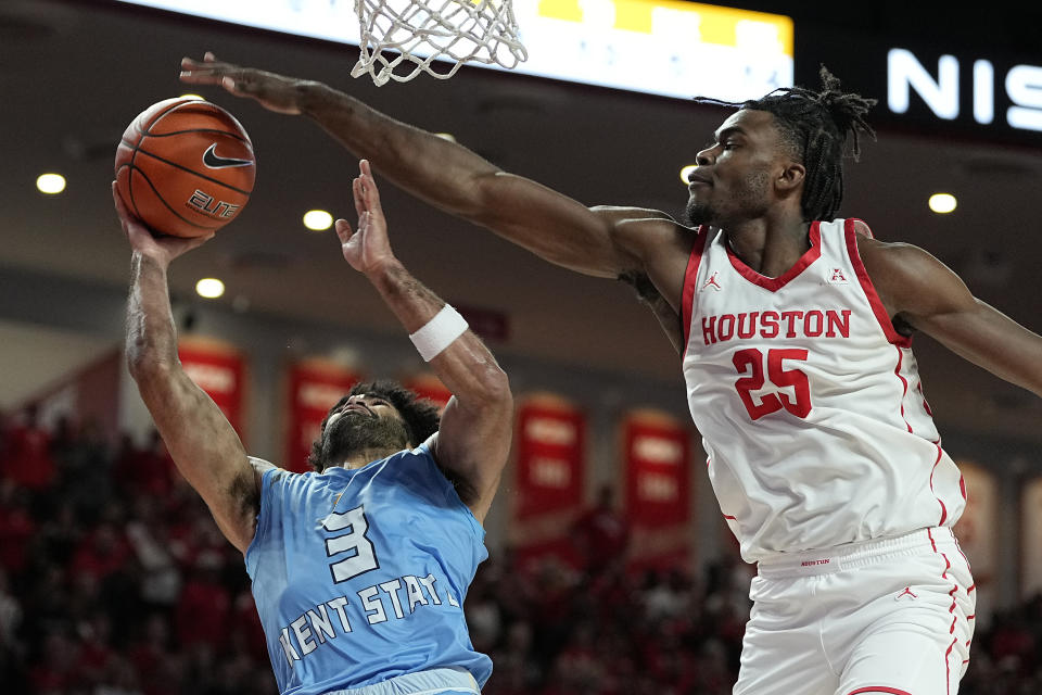 Kent State guard Sincere Carry (3) is blocked by Houston forward Jarace Walker (25) during the second half of an NCAA college basketball game Saturday, Nov. 26, 2022, in Houston. (AP Photo/Kevin M. Cox)