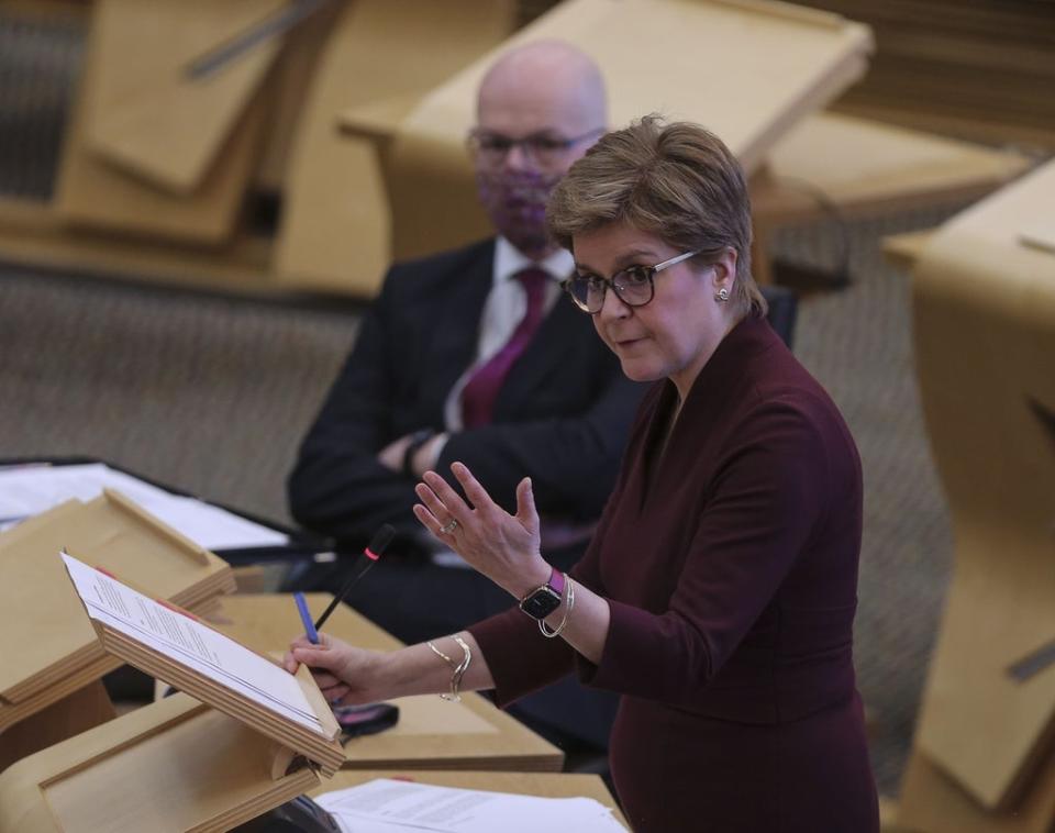 First Minister of Scotland Nicola Sturgeon MSP updates MSPs on any changes to the Covid restrictions at the Scottish Parliament Holyrood Edinburgh (PA) (PA Wire)