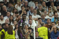 Bayern's Alphonso Davies celebrates after scoring his side's opening goal during the Champions League semifinal second leg soccer match between Real Madrid and Bayern Munich at the Santiago Bernabeu stadium in Madrid, Spain, Wednesday, May 8, 2024. (AP Photo/Jose Breton)