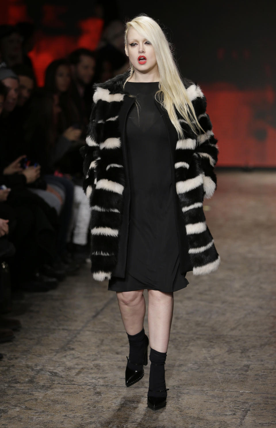 The Fall 2014 DKNY collection is modeled during Fashion Week in New York, Sunday, Feb. 9, 2014. (AP Photo/Seth Wenig)