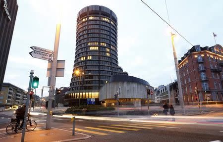 Traffic flows past in front of the Bank for International Settlements (BIS) in Basel December 5, 2013. Picture taken with long exposure. REUTERS/Arnd Wiegmann