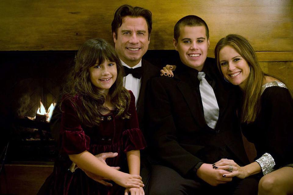 <p>Rogers and Cowan via Getty </p> John Travolta and his late wife Kelly Preston with Ella and their late son Jett in an undated photo