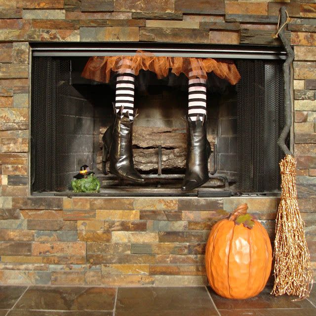 <p>Though not technically a mantel, we just had to include this cute DIY fireplace craft. Mother and daughter bloggers Jeanette and Leigh of Crafty in Crosby created this pair of witch legs out of old boots, a pool noodle, and graphic Halloween tights. </p><p><strong>See more at <a href="http://www.craftyincrosby.com/2012/10/theres-witch-in-our-fireplace.html" rel="nofollow noopener" target="_blank" data-ylk="slk:Crafty in Crosby;elm:context_link;itc:0;sec:content-canvas" class="link ">Crafty in Crosby</a>.</strong> </p>