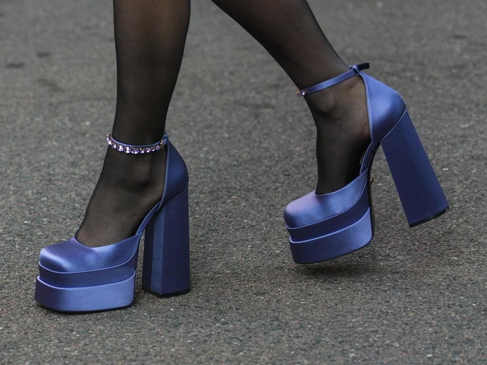 chunky purple satin block heels wore with sheer black tights