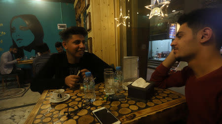 Iraqi men have coffee at a cafe called Fayruz Cafe after the famous female Lebanese singer Fayruz, in Basra, Iraq December 27, 2018. Picture taken December 27, 2018. REUTERS/Essam al-Sudani