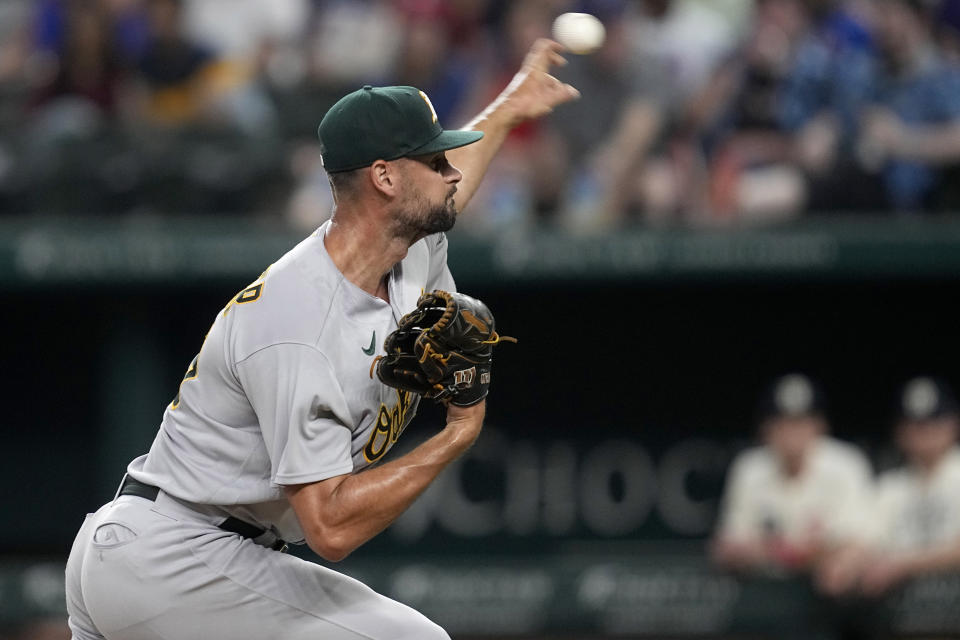 Oakland Athletics relief pitcher Kyle Muller throws to the Texas Rangers in the fifth inning of a baseball game, Saturday, Sept. 9, 2023, in Arlington, Texas. (AP Photo/Tony Gutierrez)