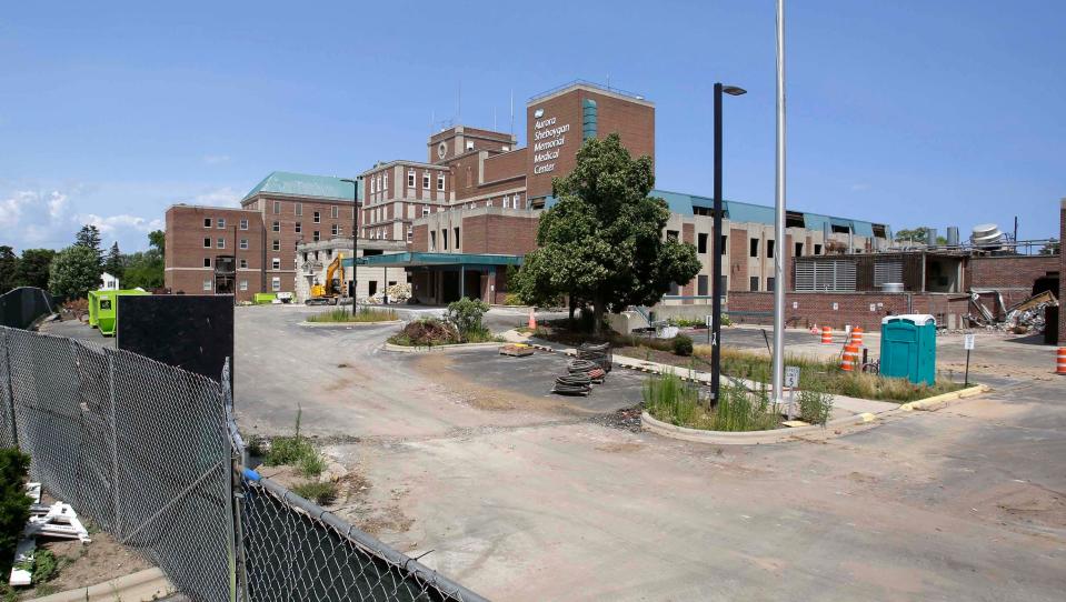 The former Aurora Sheboygan Memorial Medical Center is fenced off and is in the process of demolition as seen, Tuesday, July 18, 2023, in Sheboygan, Wis. A newly built facility on the city’s west side opened in 2022.