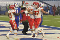 Kansas City Chiefs' Travis Kelce (87), right, celebrates a touchdown during the first half of an NFL football game against the Buffalo Bills, Monday, Oct. 19, 2020, in Orchard Park, N.Y. (AP Photo/Adrian Kraus)