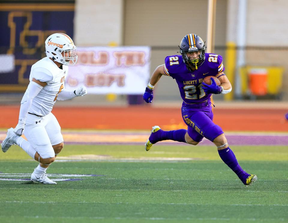 Liberty Hill senior running back Noah Long breaks a long gainer during Friday night's 82-80 win over Hutto, a bounce-back win after last week's season-opening loss to San Antonio Wagner. "We kind of needed that loss to get our heads in the right space, and it worked and we came out here and we took care of business,” Long said.