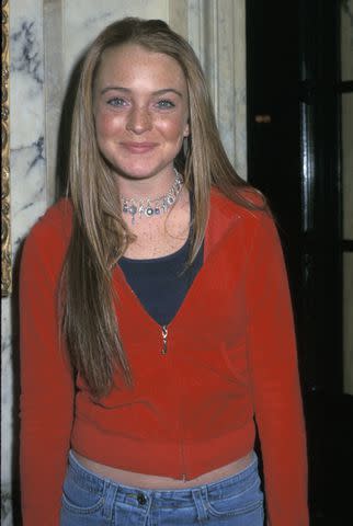 <p>Carmen Valdes/Ron Galella Collection via Getty </p> Lindsay Lohan as a teen