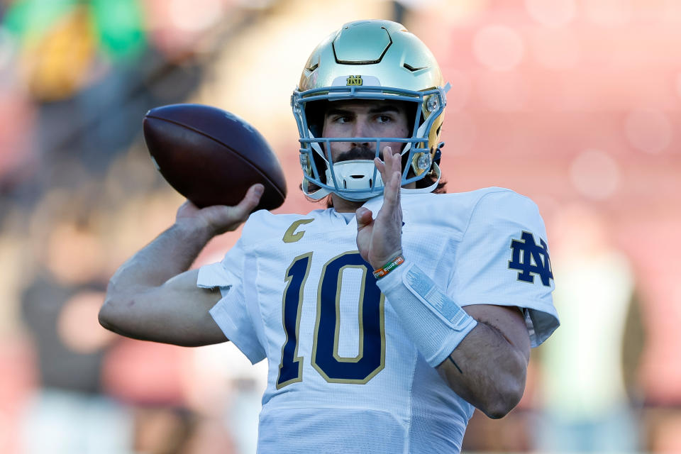 STANFORD, CALIFORNIA - NOVEMBER 25: Sam Hartman #10 of the Notre Dame Fighting Irish warms up prior to a game against the Stanford Cardinal at Stanford Stadium on November 25, 2023 in Stanford, California. (Photo by Brandon Sloter/Image Of Sport/Getty Images)