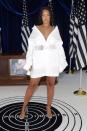 <p>In a bright white poplin shirt dress belted at the waist and Giuseppe Zanotti’s ‘SABRINA’ Clear PVC Mule with Gold Heel.</p>