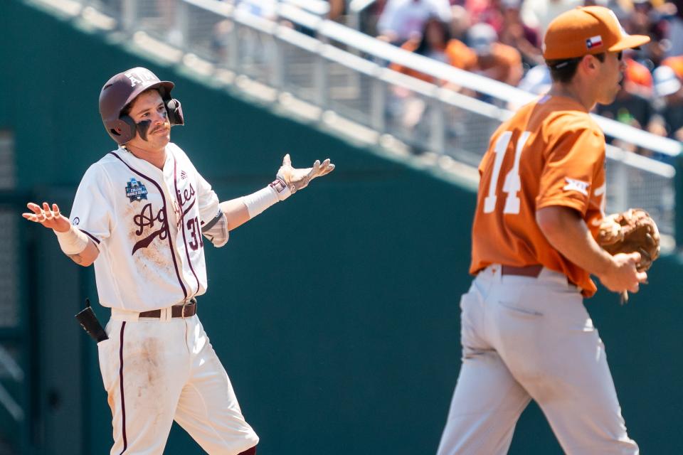 Texas A&M's Jordan Thompson reacts after hitting a double in the fourth inning of Sunday's 10-2 win over Texas at the College World Series. The Longhorns ended their season by going 0-2 in Omaha.