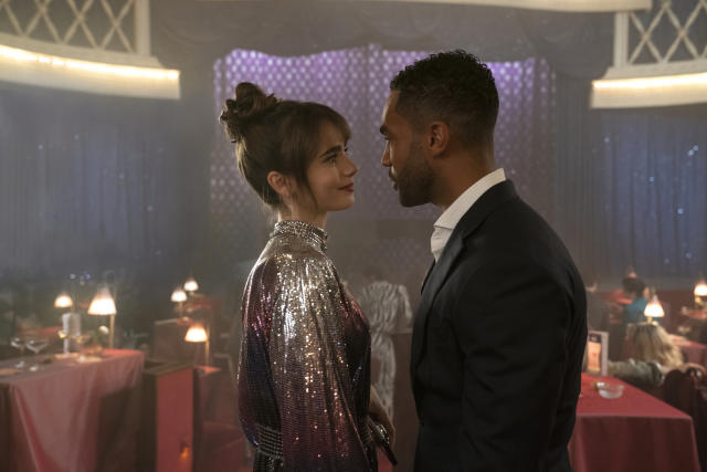 Emily in Paris. (L to R) Lily Collins as Emily, Lucien Laviscount as Alfie in episode 303 of Emily in Paris. Cr. St&#xc3;&#xa9;phanie Branchu/Netflix &#xc2;&#xa9; 2022