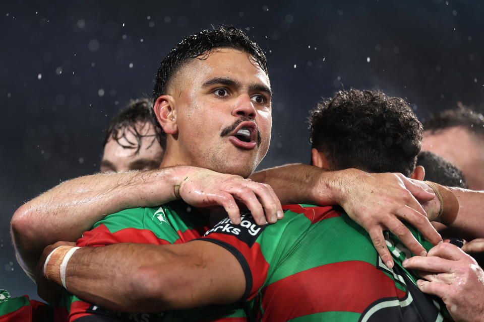 SYDNEY, AUSTRALIA - JUNE 14: Latrell Mitchell of the Rabbitohs celebrates a try by team mate Alex Johnston of the Rabbitohs during the round 15 NRL match between South Sydney Rabbitohs and Brisbane Broncos at Accor Stadium, on June 14, 2024, in Sydney, Australia. (Photo by Cameron Spencer/Getty Images)