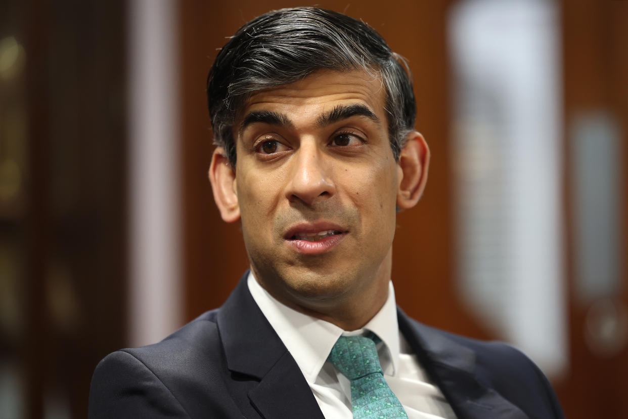 LONDON, ENGLAND - MARCH 11: Prime Minister Rishi Sunak (R) talks with Ahmad Al Dubayan, Director General of the London Central Mosque (not in frame) during a visit to the Mosque on March 11, 2024 in London, England. (Photo by Daniel Leal -  WPA Pool / Getty Images)