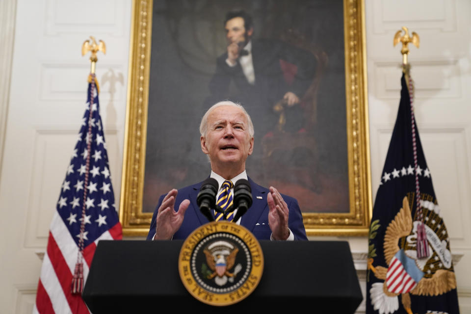 President Joe Biden delivers remarks on the economy in the State Dining Room of the White House, Friday, Jan. 22, 2021, in Washington. (AP Photo/Evan Vucci)